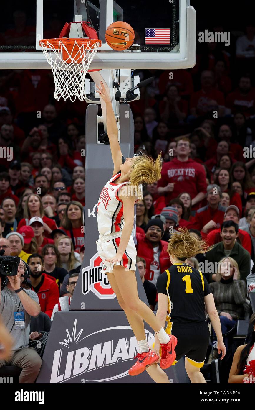 Columbus, Ohio, USA. 21st Jan, 2024. Ohio State Buckeyes guard Jacy Sheldon (4) lays up a shot under the basket in front of Iowa Hawkeyes guard Molly Davis (1) during the game between the Iowa Hawkeyes and the Ohio State Buckeyes at Value City Arena, Columbus, Ohio. (Credit Image: © Scott Stuart/ZUMA Press Wire) EDITORIAL USAGE ONLY! Not for Commercial USAGE! Stock Photo
