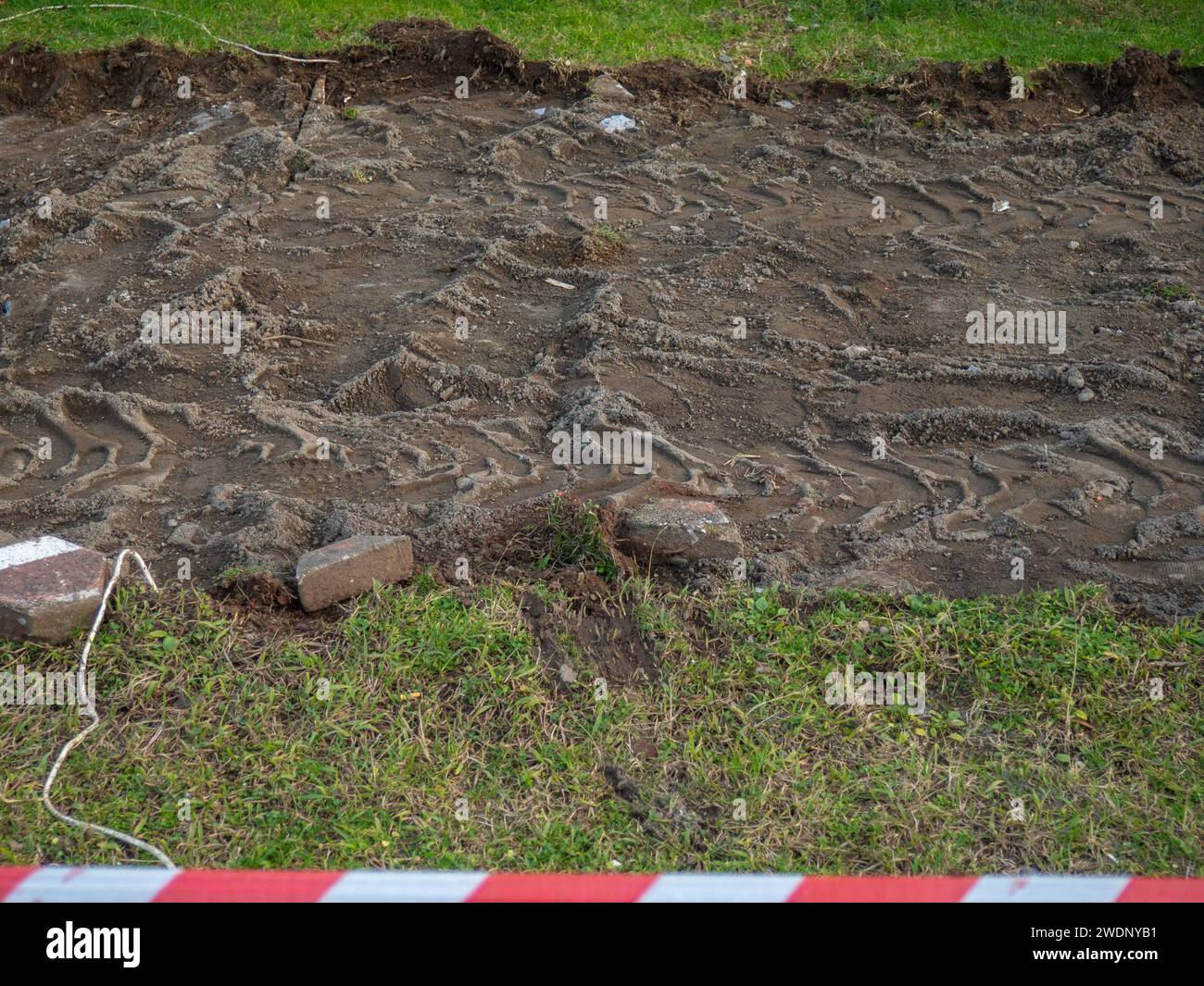 Reconstruction of the bike path. Replacing tiles on a bike path among ...