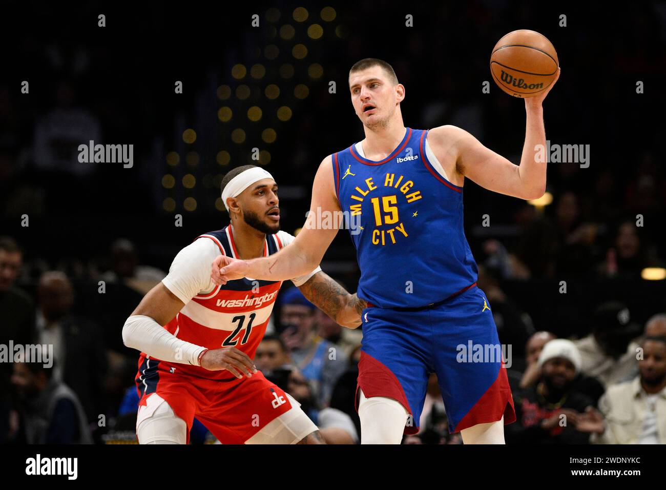 Denver Nuggets center Nikola Jokic (15) handles the ball against