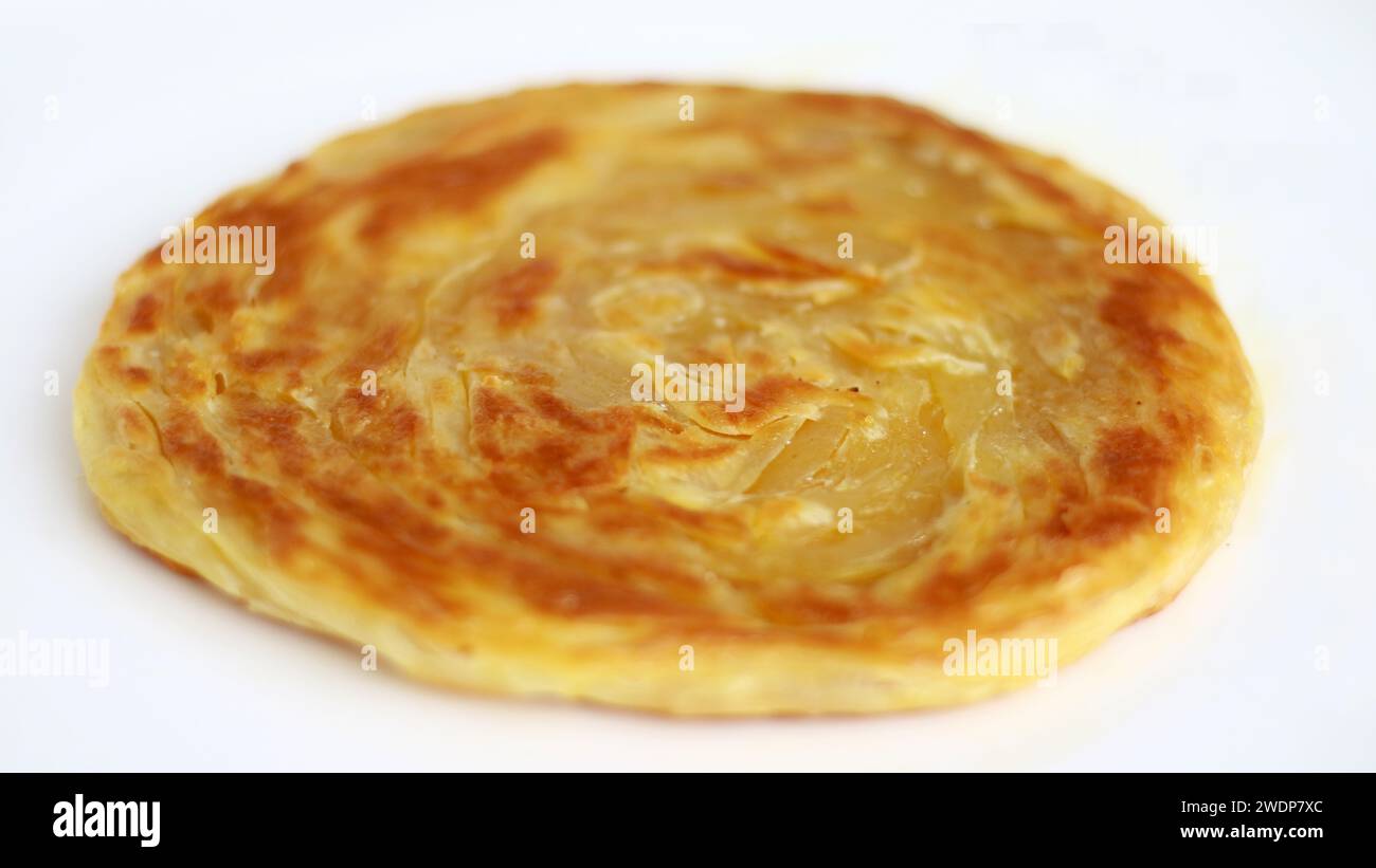 Roti Canai or Roti Paratha on white background Stock Photo - Alamy
