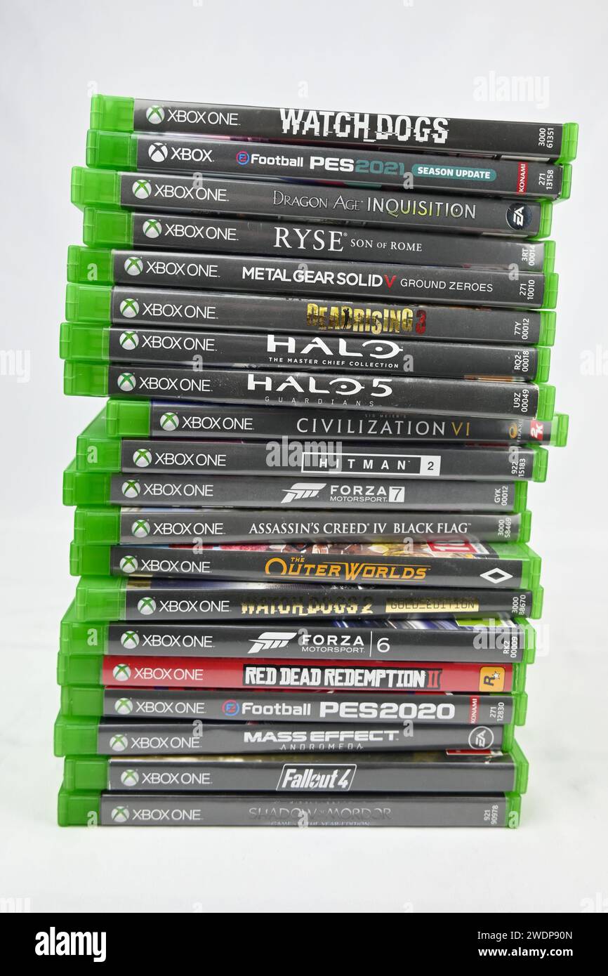 Xbox One video games stacked vertical  – Wales, UK  –  21 January 2024 Stock Photo