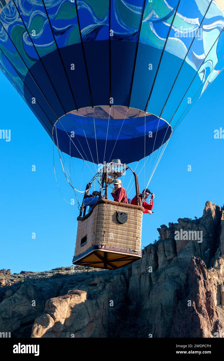 Hot air ballon rises above Smith Rock State Park in Central Oregon