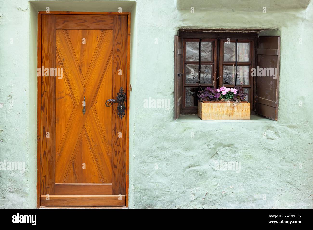 vintage door and windows on stone wall Stock Photo