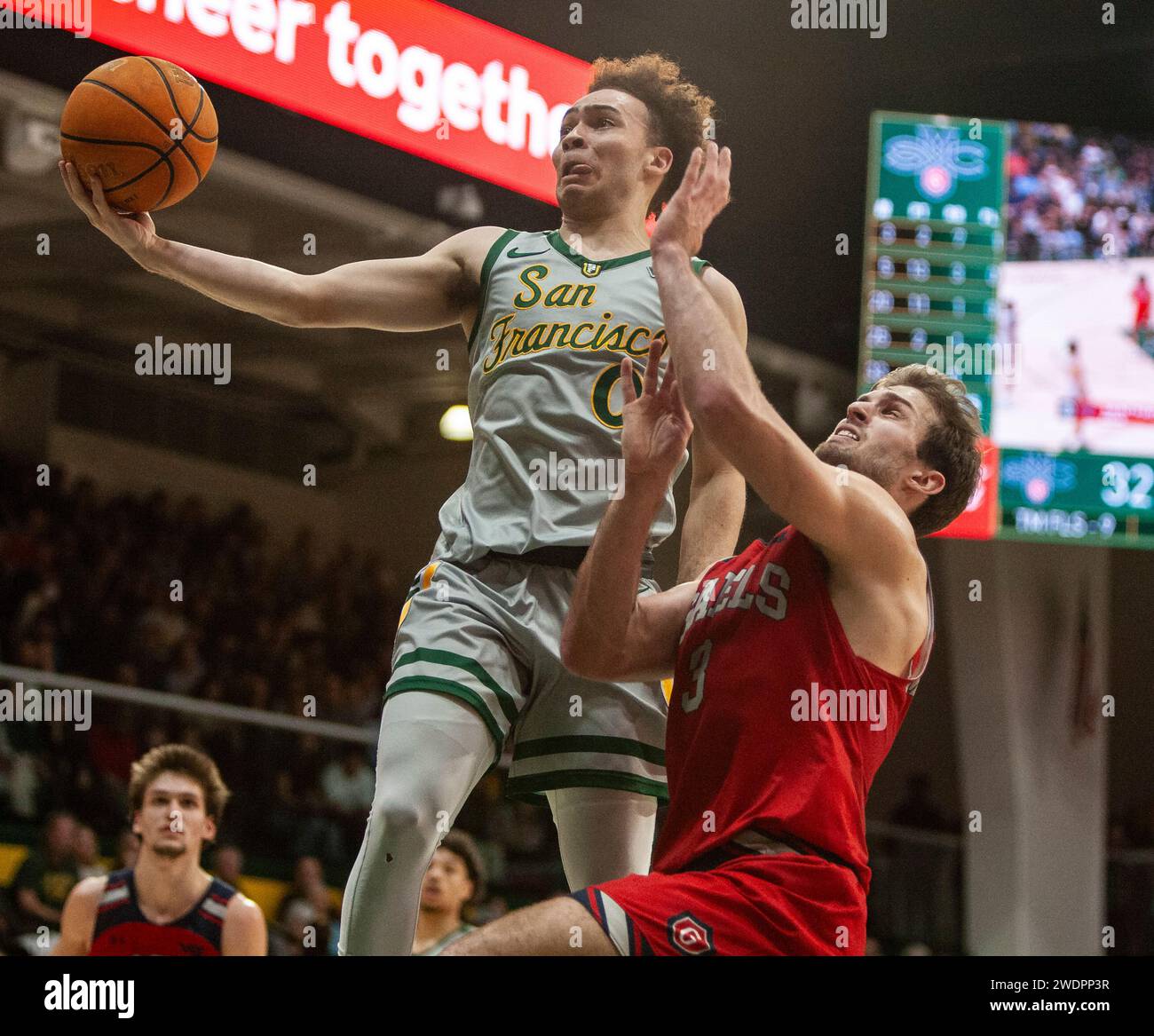 January 20 2024 San Francisco CA, U.S.A. San Francisco guard Ryan Beasley (0)drives to the hoop