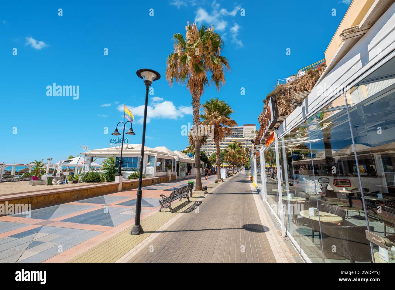 View looking down seaside promenade Paseo de Maritimo in Torremolinos. Andalusia, Spain Stock Photo