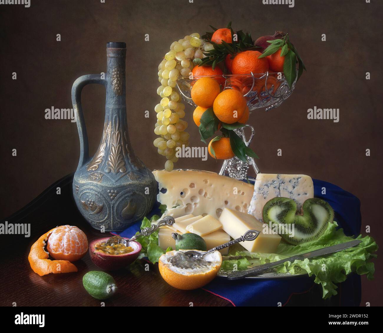Still life with cheese and fruits Stock Photo - Alamy