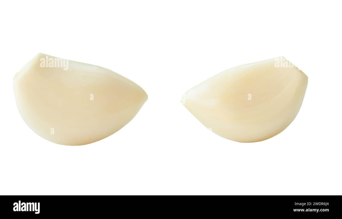 Peeled garlic cloves in set is isolated on white background with ...
