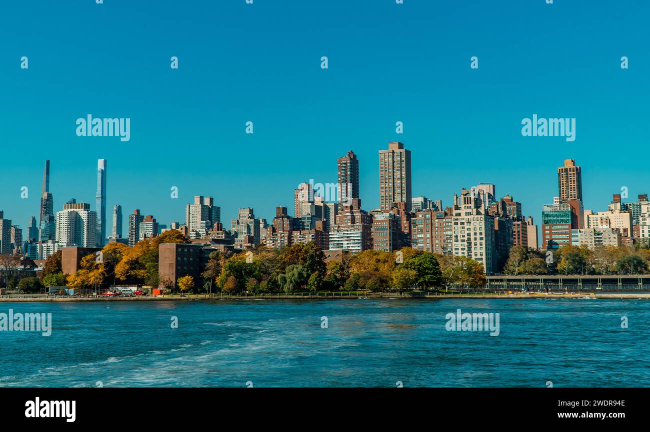 Panoramic view of Manhattan seen from the East River Stock Photo - Alamy