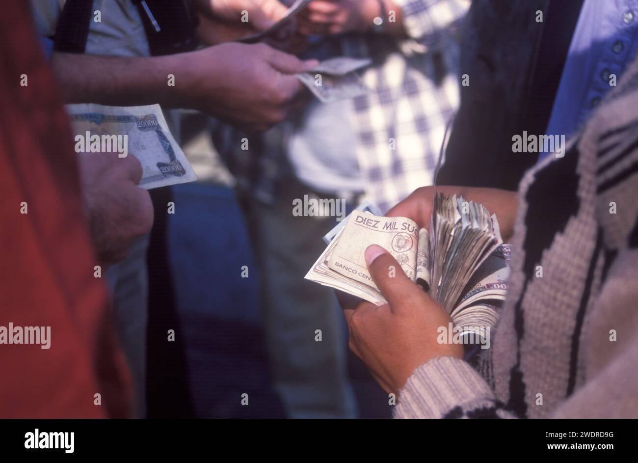 Changing money in the street Stock Photo
