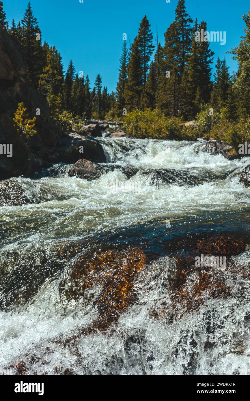 rushing summer river in Wyoming, Big Horn Mountains Sheridan Stock Photo