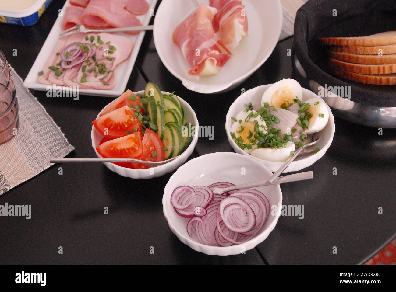 Copenhagen /Denmark / 29 October 2021 /Cold lunch table with ham, melons and ham and heeing fish sild wihe wine mateus and little this anmd litle bit that freench cold lunch table in capital.Photo. FRRcis Joseph Dean/Dean Pictures Stock Photo