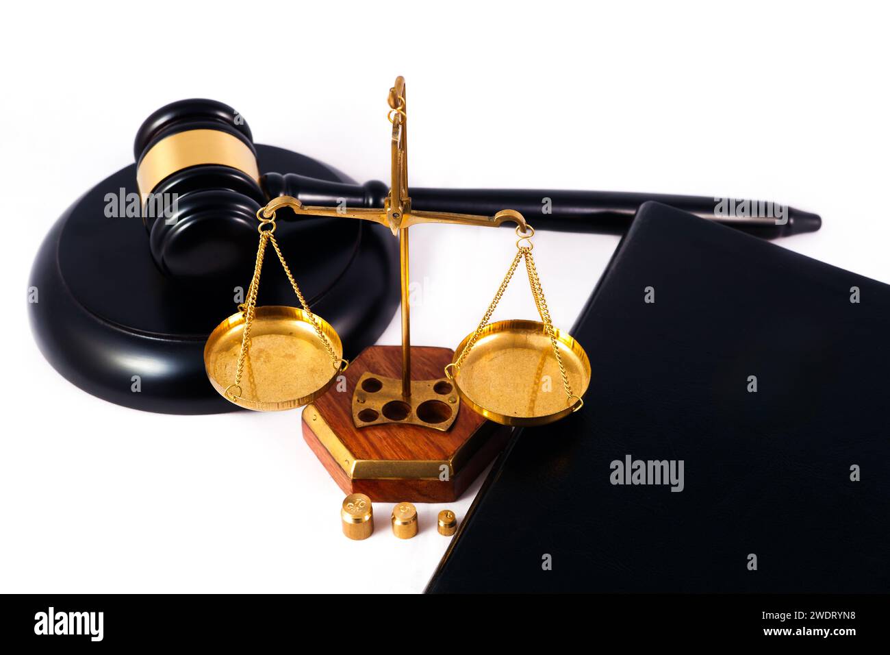The judge's gavel with the scales of justice and the holy bible Stock
