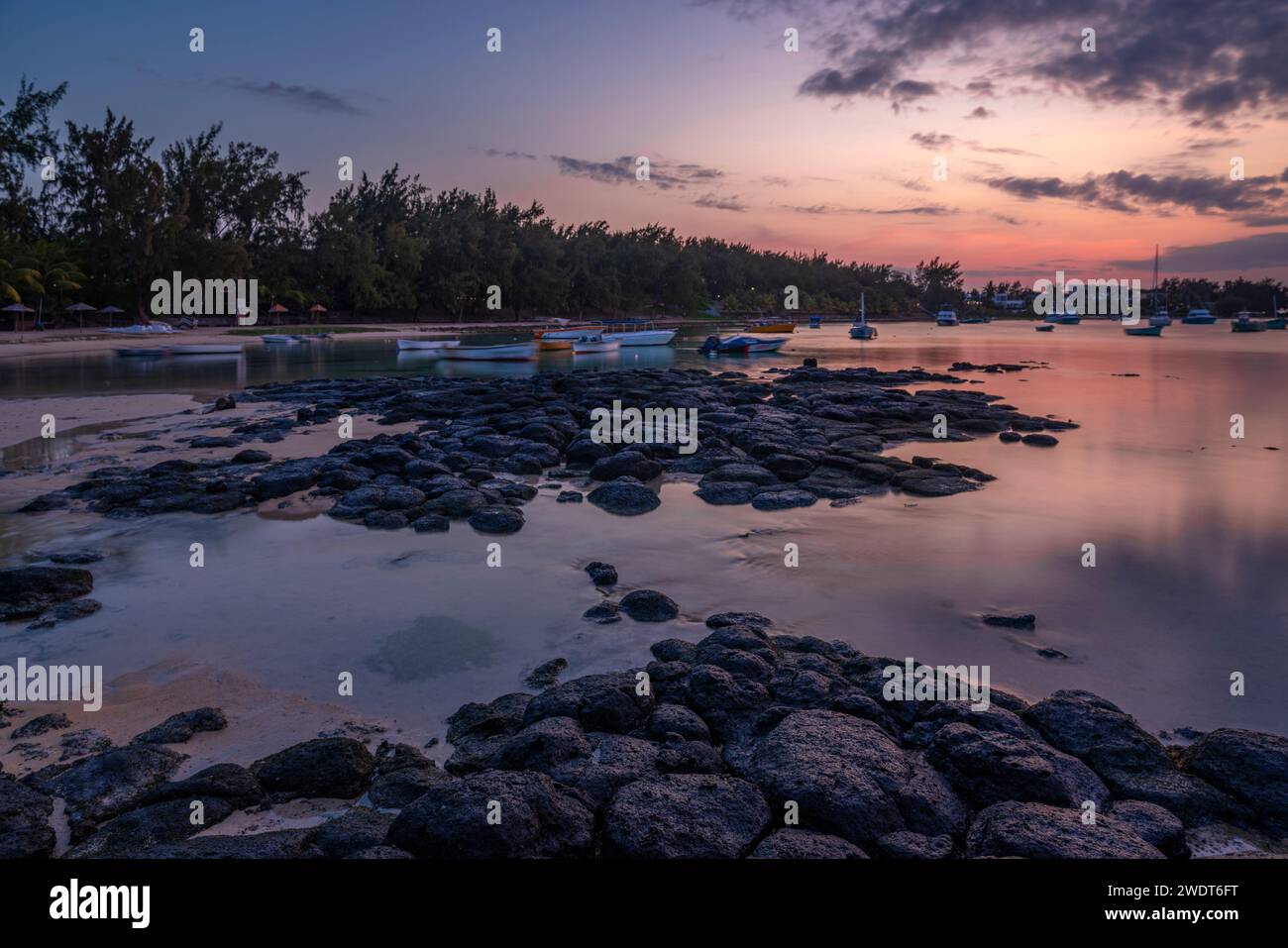 View of beach and Indian Ocean at dusk in Cap Malheureux, Mauritius, Indian Ocean, Africa Stock Photo
