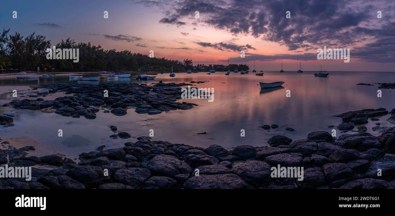 View of beach and Indian Ocean at dusk in Cap Malheureux, Mauritius, Indian Ocean, Africa Stock Photo