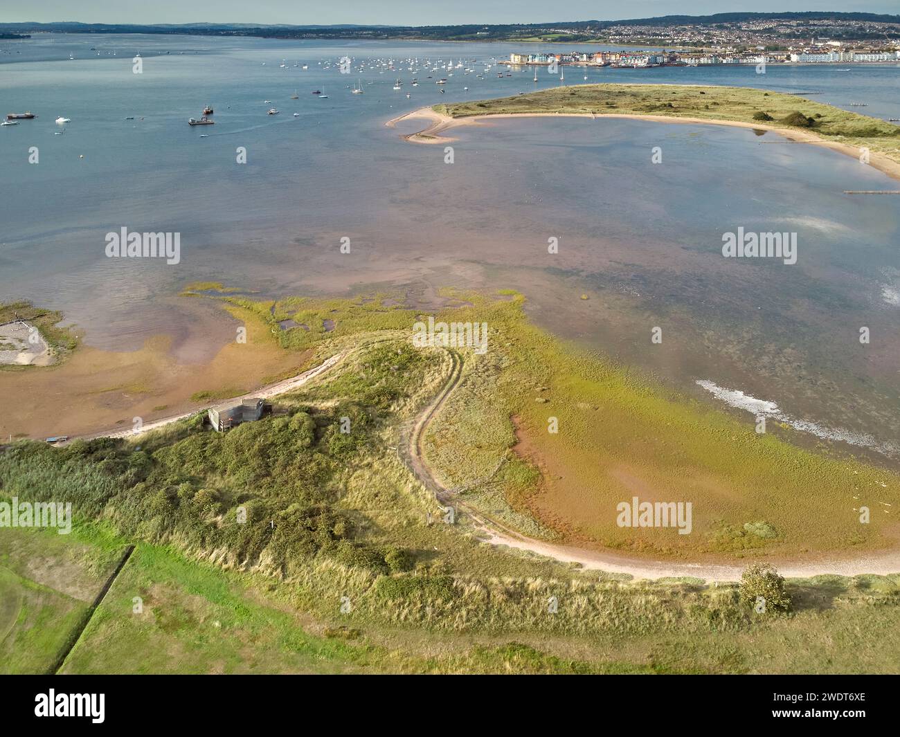 Aerial view of the mouth of the River Exe, seen from above Dawlish Warren and looking towards the town of Exmouth, Devon, England, United Kingdom Stock Photo