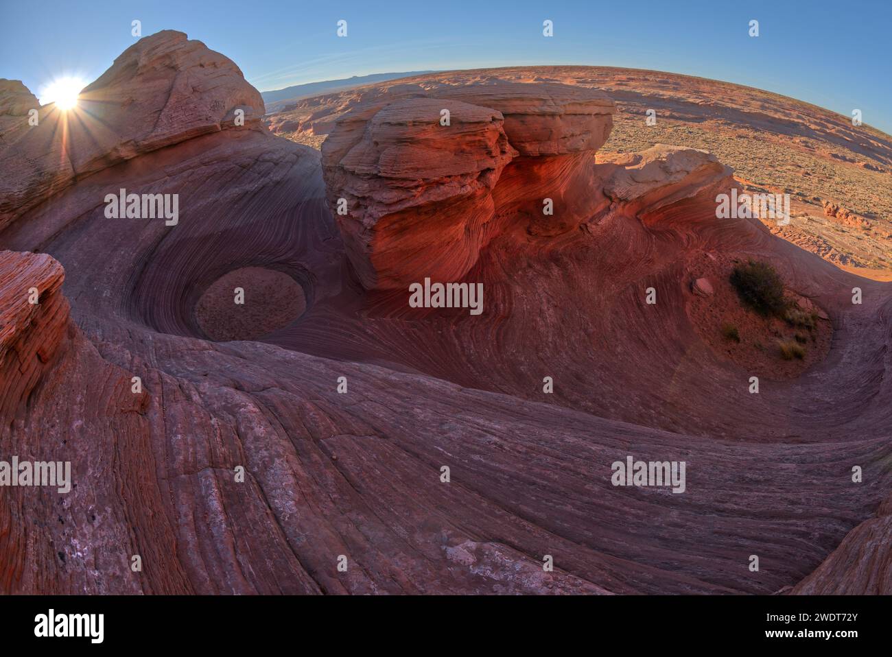 The west rock ridge of the New Wave along the Beehive Trail in the Glen Canyon Recreation Area near Page, Arizona, United States of America Stock Photo