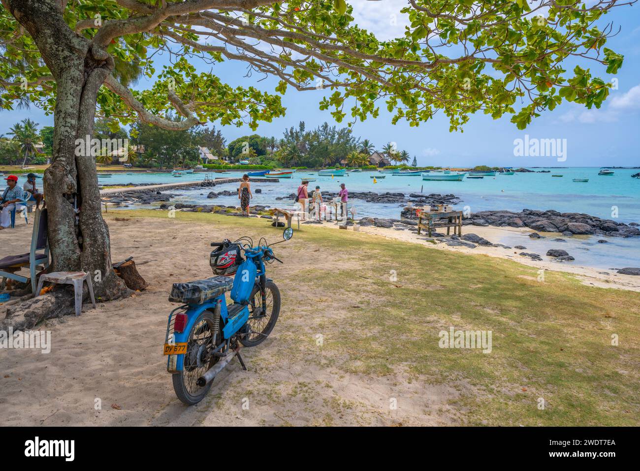 View of beach and traders on sunny day in Cap Malheureux, Mauritius, Indian Ocean, Africa Stock Photo