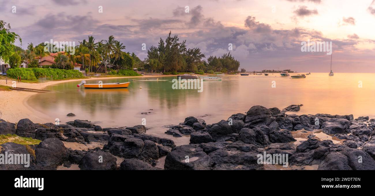 View of beach and Indian Ocean at sunset in Cap Malheureux, Mauritius, Indian Ocean, Africa Stock Photo