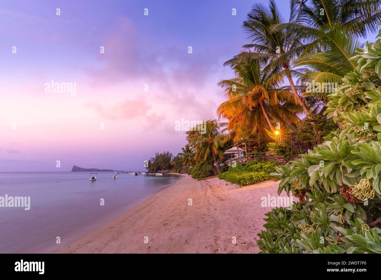 View of beach and Indian Ocean at dusk in Cap Malheureux, Mauritius, Indian Ocean, Africa Stock Photo