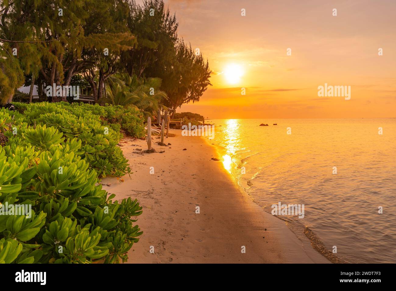 View of beach and Indian Ocean at sunset in Cap Malheureux, Mauritius, Indian Ocean, Africa Stock Photo