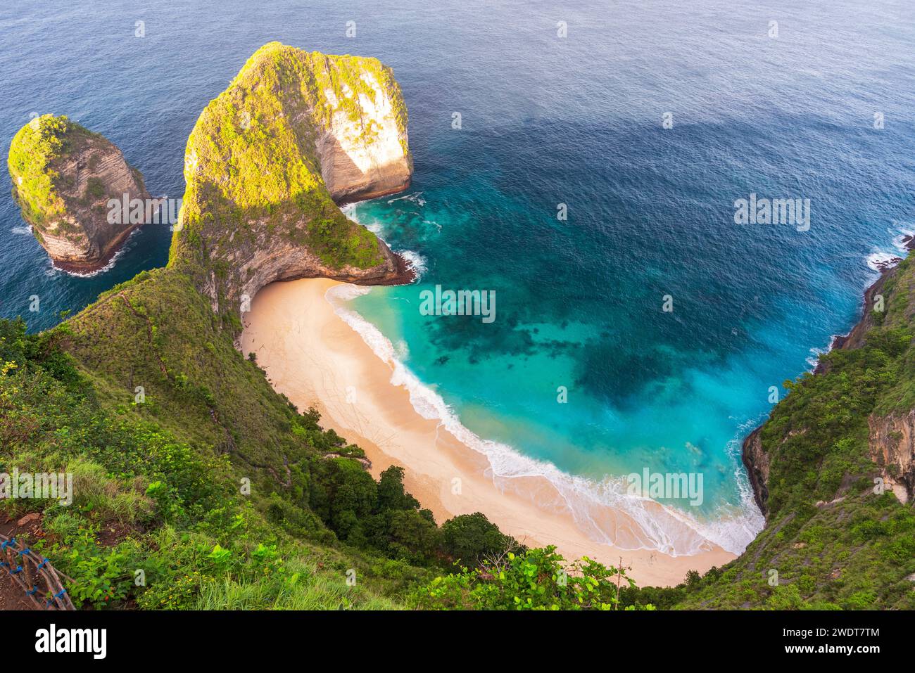 Kelingking white and sandy beach (T-Rex Beach) seen from above at sunrise, Nusa Penida island, Klungkung regency, Bali, Indonesia, Southeast Asia Stock Photo
