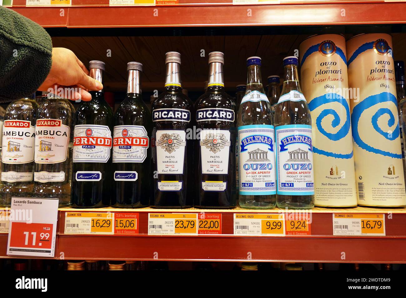 Anise-flavored spirits in a grocery Stock Photo