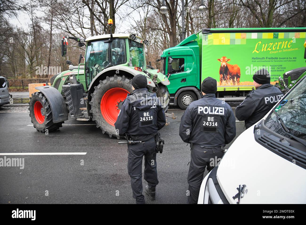 Berlin,Germany 14th january 2024.Farmers and truckers are protesting at the Brandenburger Tor against subsidy cuts. Stock Photo