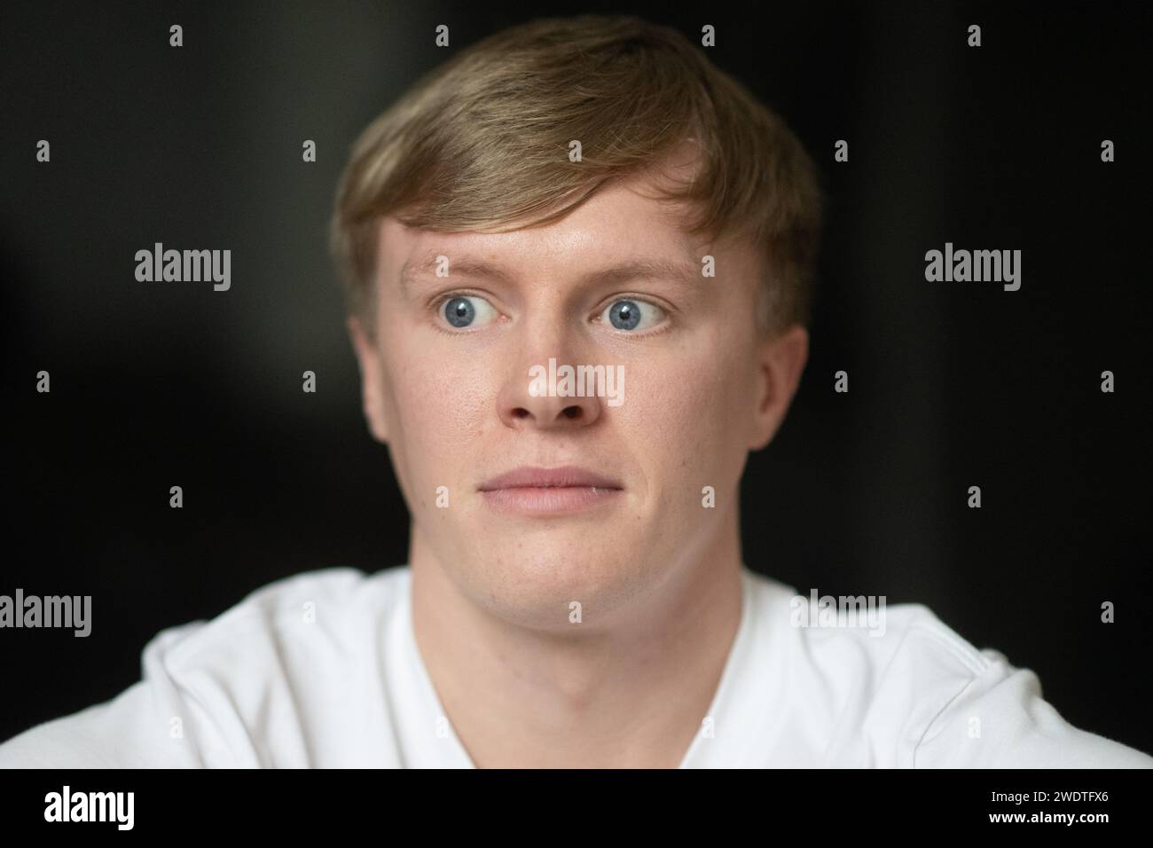 18 January 2024, BadenWürttemberg, Crailsheim Influencer Liam Carpenter sits in his apartment