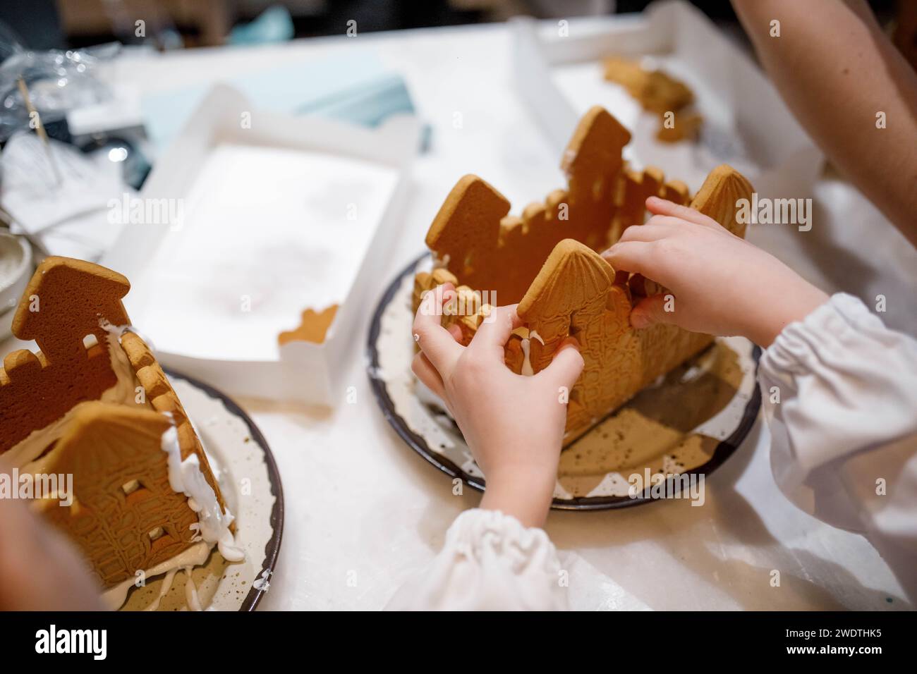 Child hands decorating cake hi-res stock photography and images - Alamy