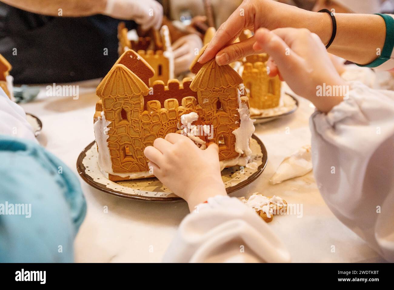 Child hands decorating cake hi-res stock photography and images - Alamy