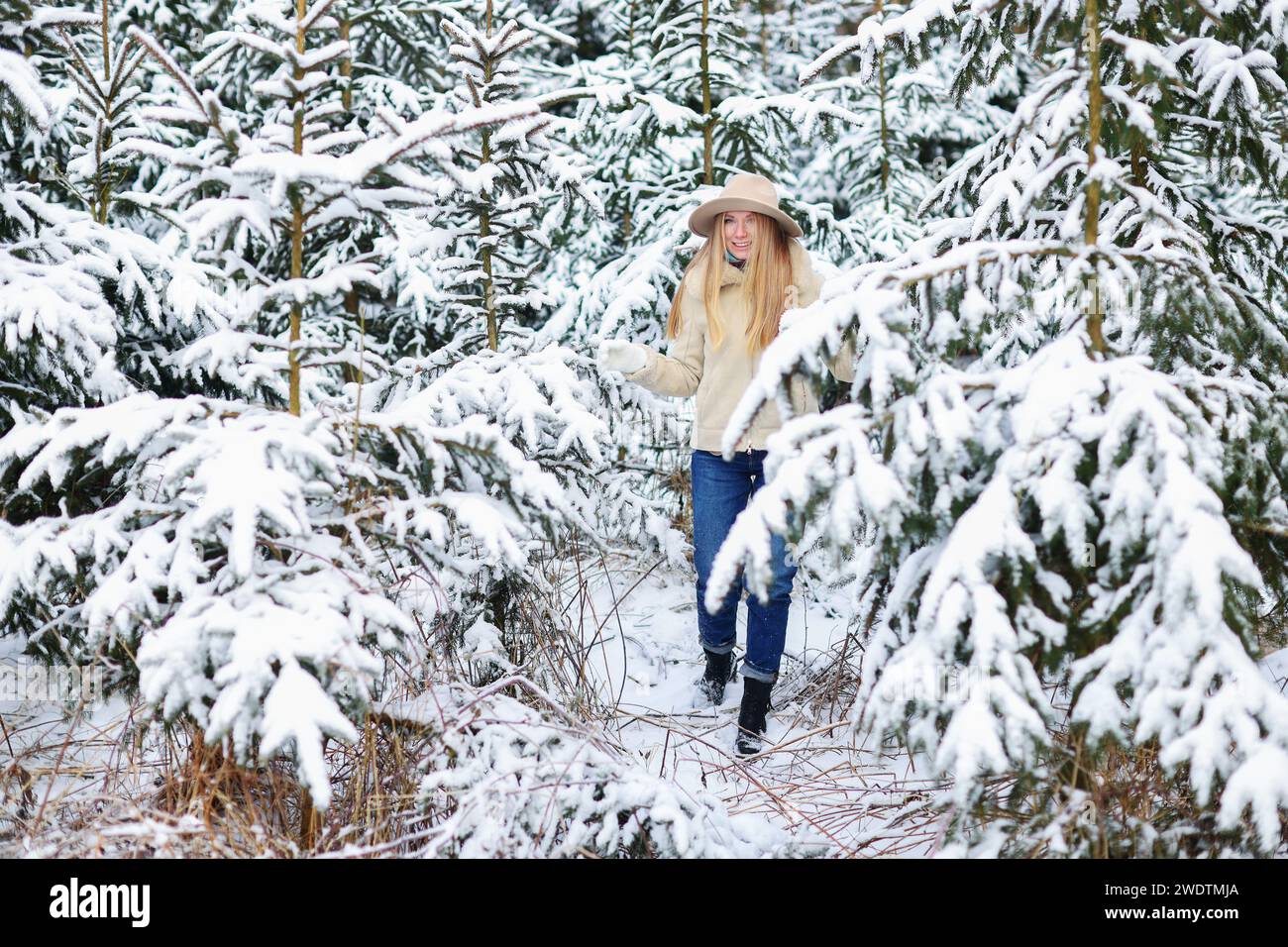 Girl walking alone in forest hi-res stock photography and images - Alamy