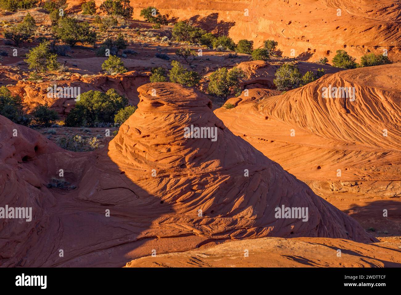 Cross-bedding patterns in the eroded sandstone in Mystery Valley in the Monument Valley Navajo Tribal Park in Arizona. Stock Photo
