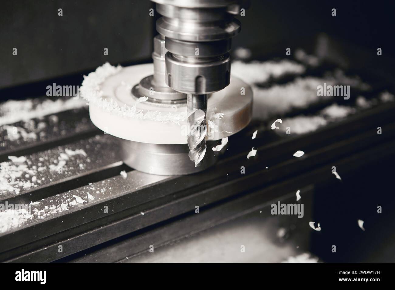 Grinding of plastic element on CNC machine. Manufacturing of the shock ...