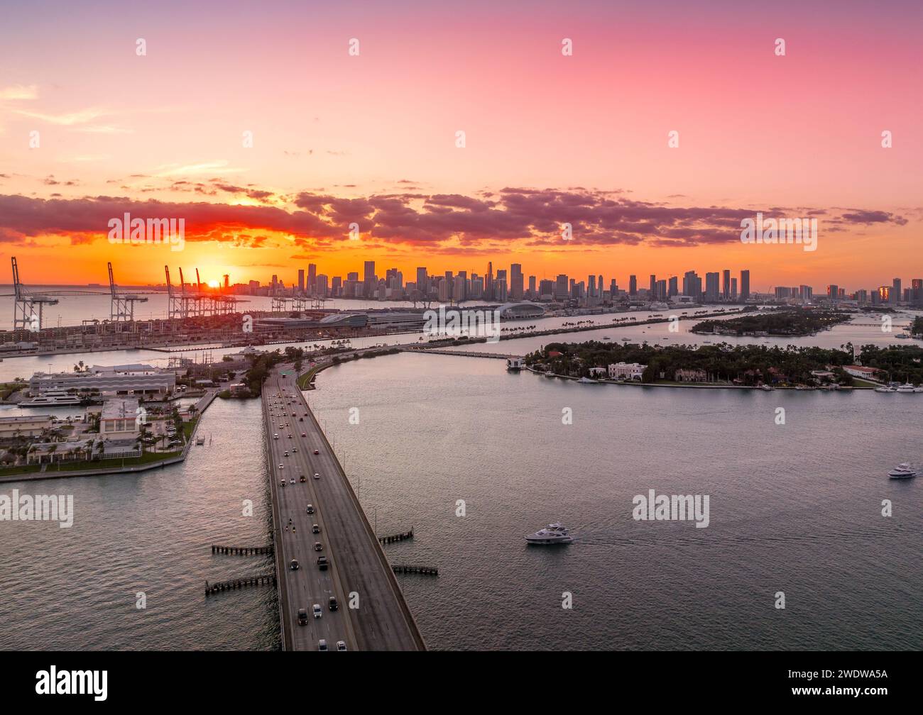 Aerial sunset view of McArthur causeway, Dodge Island near Miami South ...