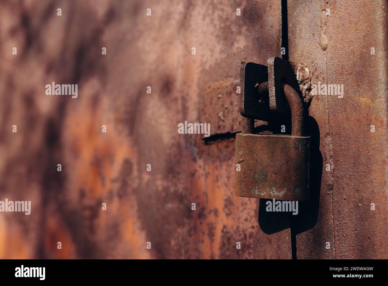 a rusty lock on the door Stock Photo