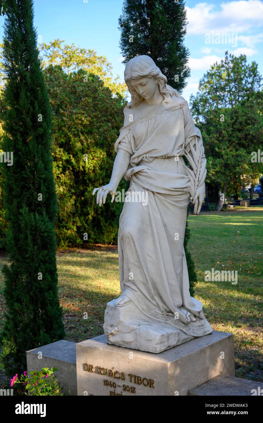 weeping figure statue at Kerepesi Cemetery Fiume Road National Graveyard Budapest, Hungary Founded in 1847, a national pantheons and memorial park Stock Photo
