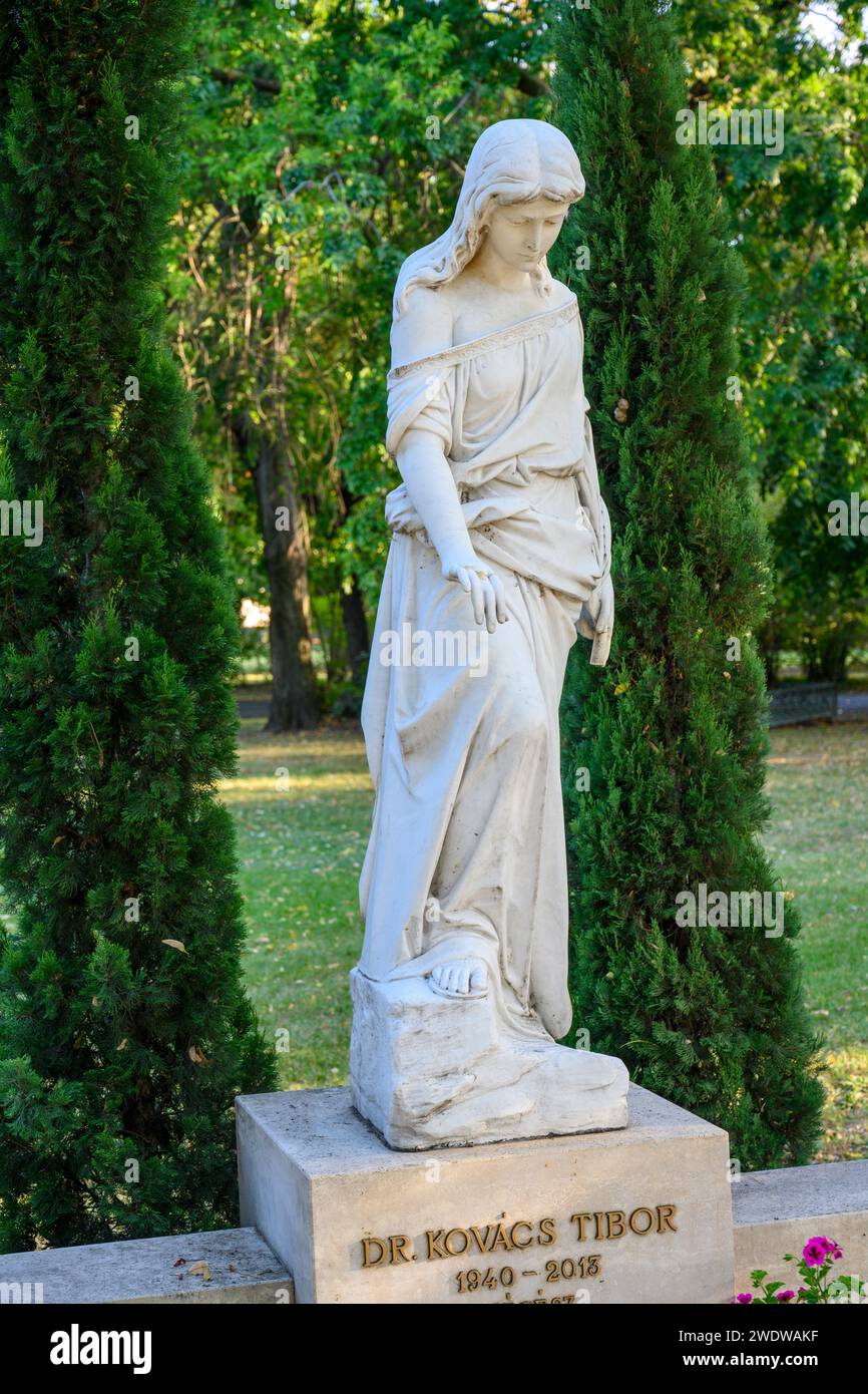 weeping figure statue at Kerepesi Cemetery Fiume Road National Graveyard Budapest, Hungary Founded in 1847, a national pantheons and memorial park Stock Photo