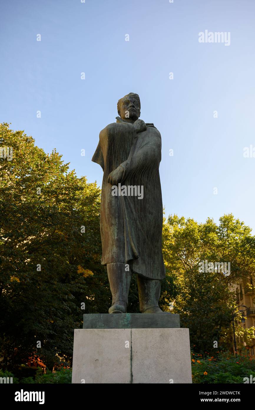 Statue of the Hungarian poet Endre Ady in Andrassy ut, a busy road in the Terezvaros district of Budapest. Stock Photo