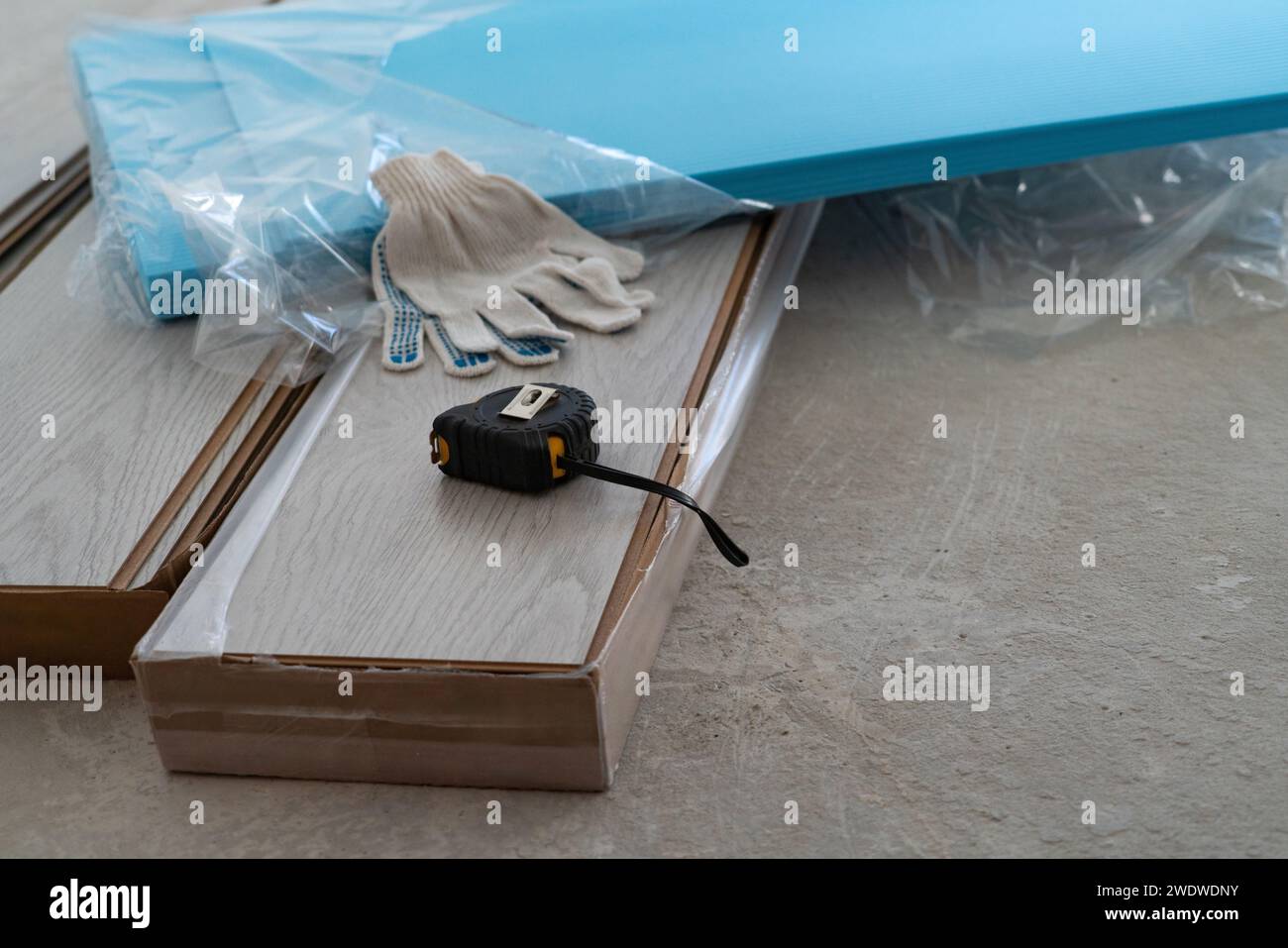 Repairing the floor in the house, laminate flooring Stock Photo - Alamy