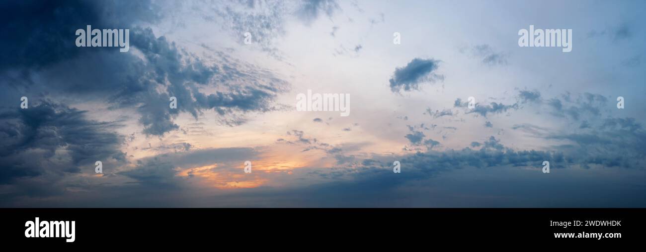 Dramatic sky with clouds at sunset. Natural sky background. Stock Photo
