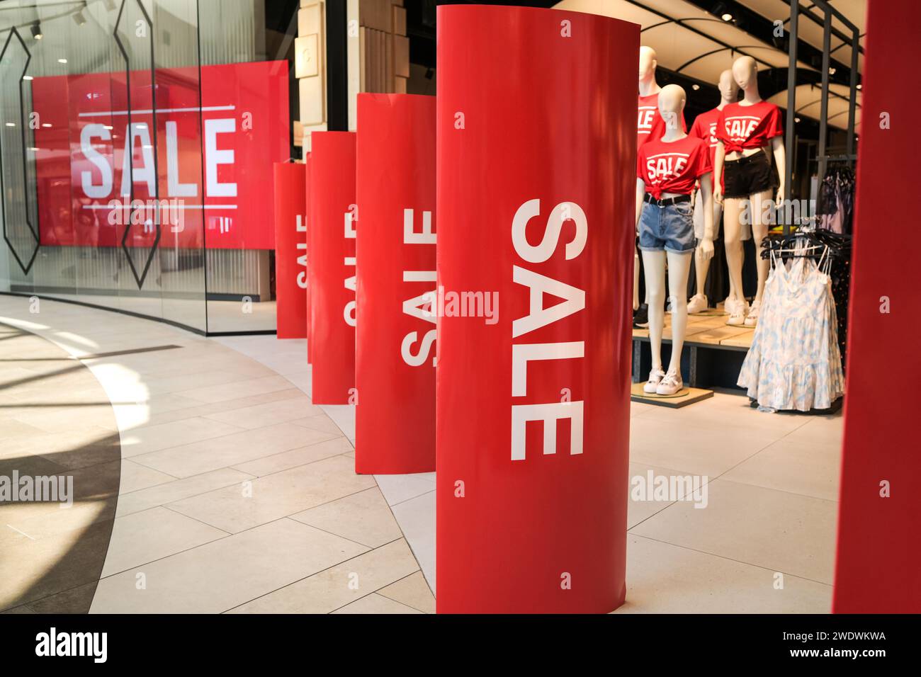 Advertising Sales On Store Display In Shopping Center Captivates Many Shoppers Stock Photo Alamy