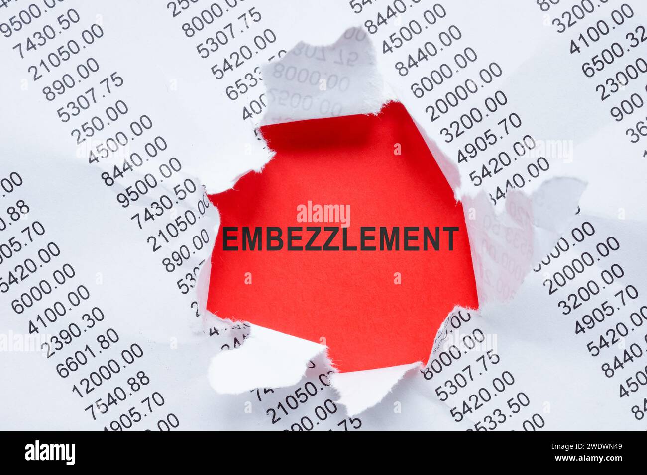 Word Embezzlement and torn paper with data Stock Photo - Alamy