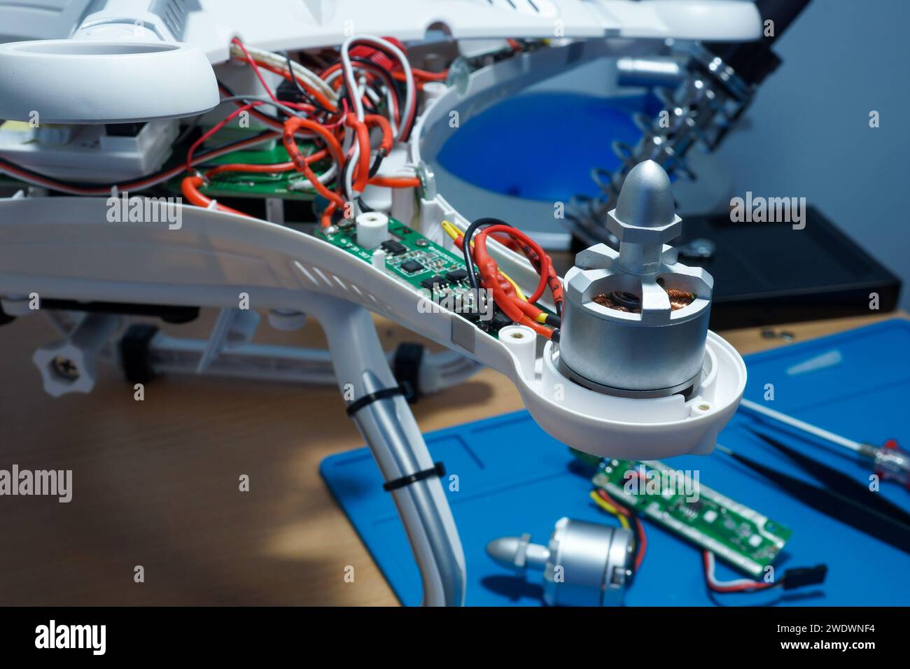 UAV repair. Disassembled drone and spare parts. Stock Photo