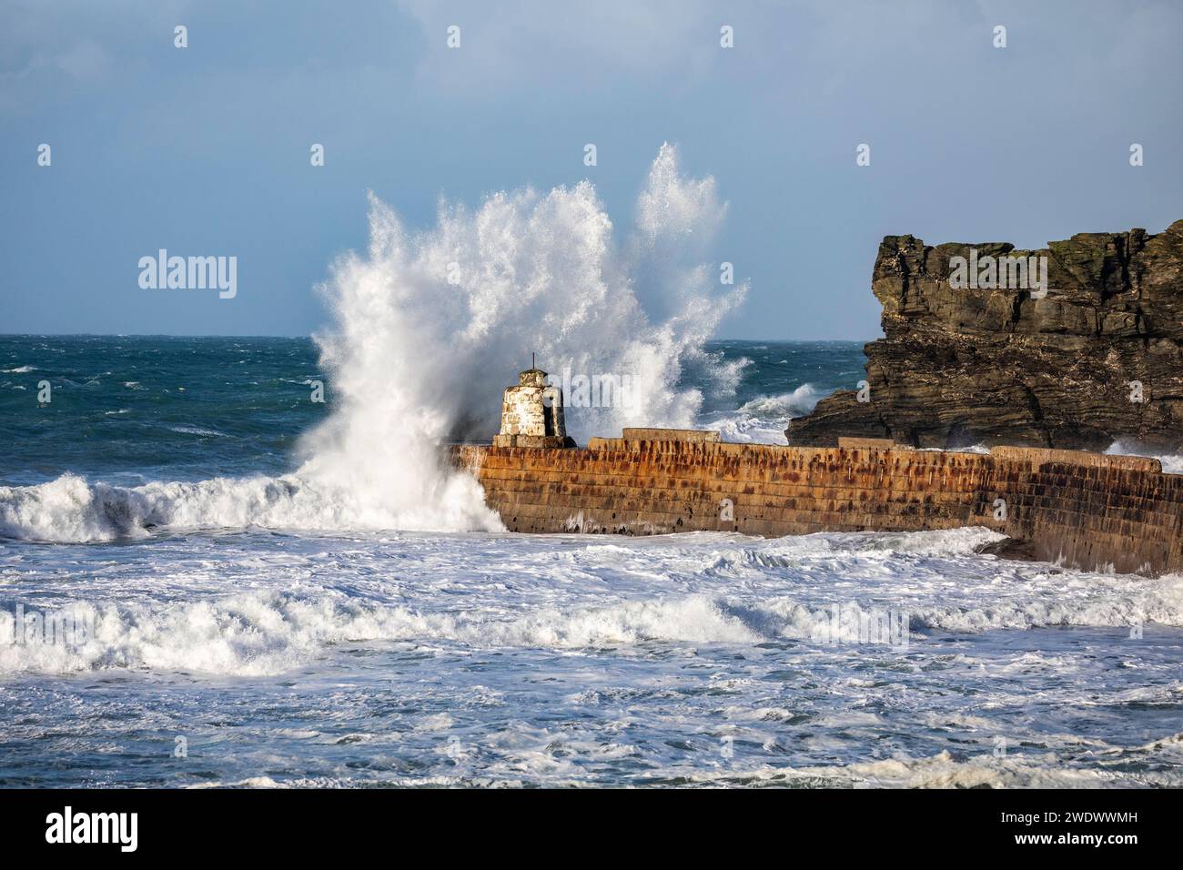 Portreath, Cornwall, 22nd January 2024, Following Storm Isha, which crossed the South West, there were still large waves and stormy seas in Portreath, Cornwall. The Temperature was 10C and the forecast is for the gusty winds to continue all day ahead of Storm Jocelyn due tomorrow. Credit: Keith Larby/Alamy Live News Stock Photo