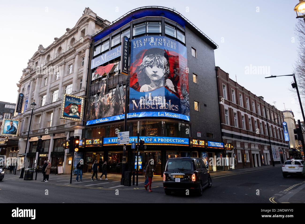 West End theatre show poster for Les Miserables at the Sondheim Theatre on Shaftesbury Avenue at the heart of Londons Theatreland on 19th January 2024 in London, United Kingdom. West End theatre is mainstream professional theatre staged in the large theatres in and near the West End of London, which has also been nicknamed Theatreland. West End theatre is usually considered to represent the highest level of commercial theatre. Stock Photo