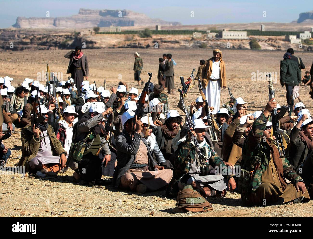 Sanaa, Sanaa, Yemen. 22nd Jan, 2024. Tribal supporters of Yemen's Houthis hold up their weapons during armed a protest against the U.S. government designating Houthis as a terror group in Sanaa, Yemen. Credit: ZUMA Press, Inc./Alamy Live News Stock Photo