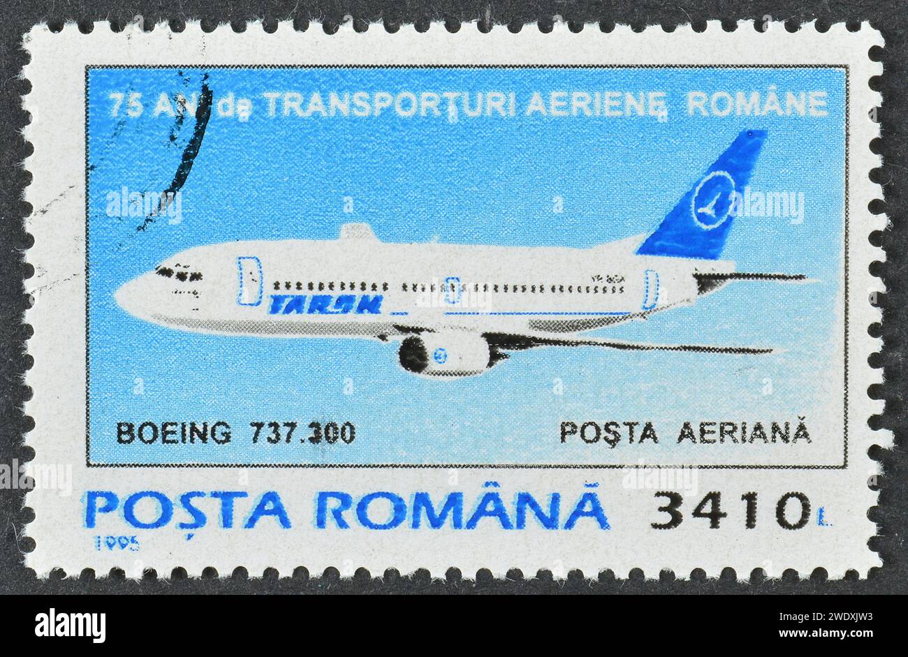 Cancelled postage stamp printed by Romania, that shows Boeing 737-300, circa 1995. Stock Photo