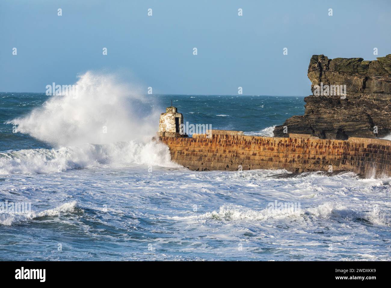 Portreath, Cornwall, 22nd January 2024, Following Storm Isha, which crossed the South West, there were still large waves and stormy seas in Portreath, Cornwall. The Temperature was 10C and the forecast is for the gusty winds to continue all day ahead of Storm Jocelyn due tomorrow. Credit: Keith Larby/Alamy Live News Stock Photo