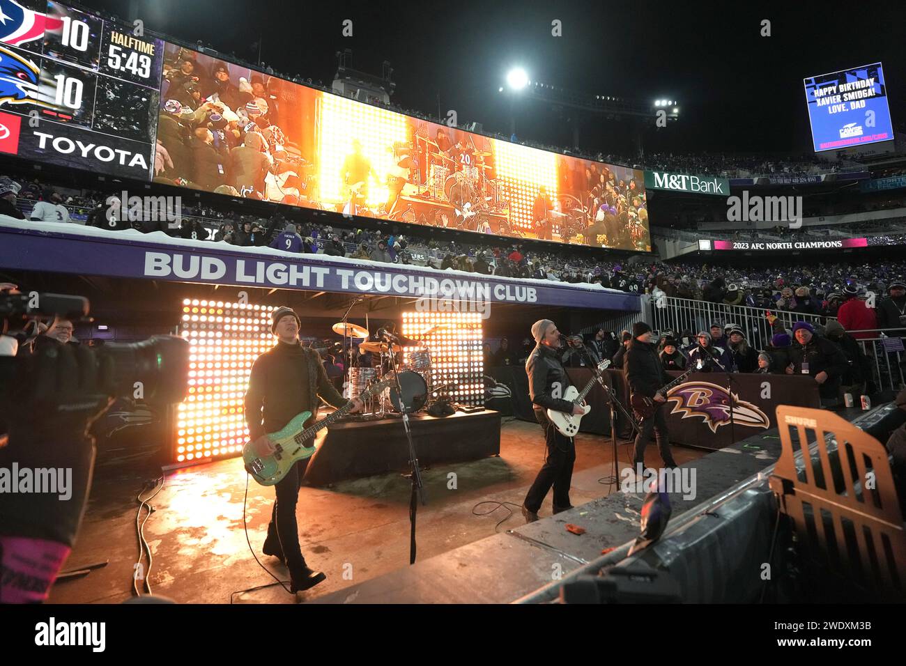 BALTIMORE, MARYLAND, JAN 20: Recording artist Jimmy Eat World performs during the in the AFC Divisional Playoff game at M&T Bank Stadium on January 20, 2024 in Baltimore, Maryland. From left: bassist Rick Burch, durmmer Zach Lind, lead vocalist Jim Adkins and guitarist Tom Linton. Stock Photo