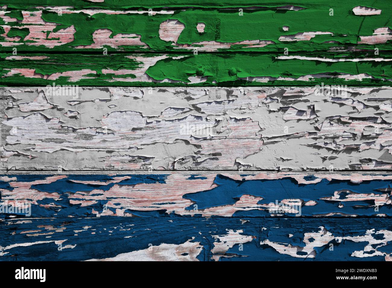 Flag of Sierra Leone painted on a grunge wooden board Stock Photo - Alamy
